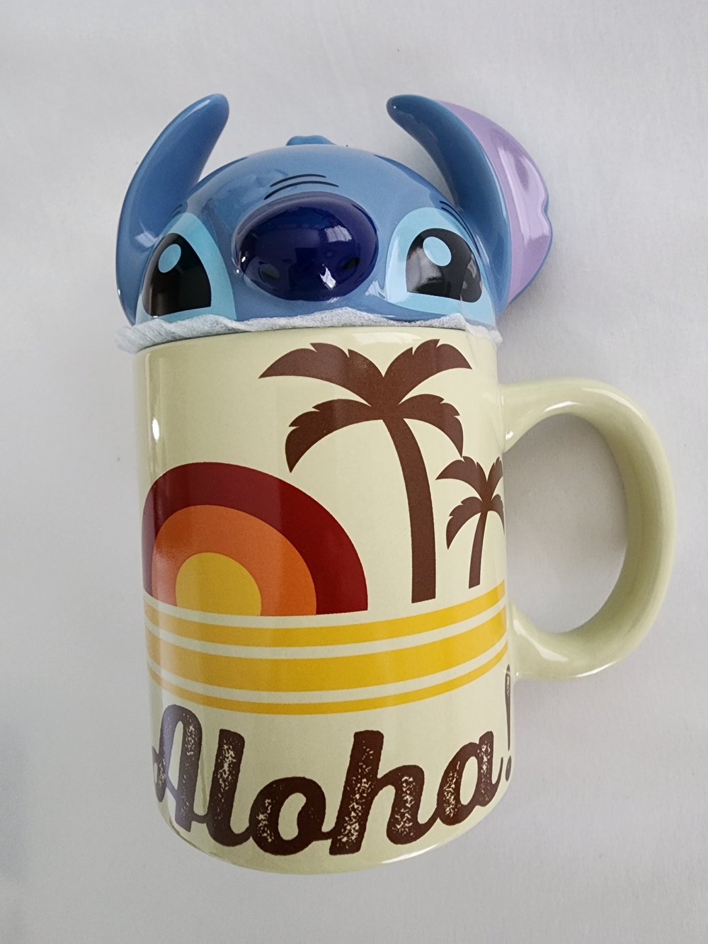 Disney Cream Mug with Blue Stitch Character Lid and Retro Rainbow